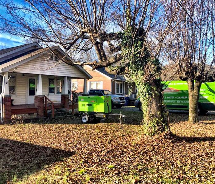 SERVPRO of Lake Lure Forest City trucks parked in front of a Marion, NC home