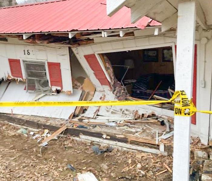 house damaged by storm